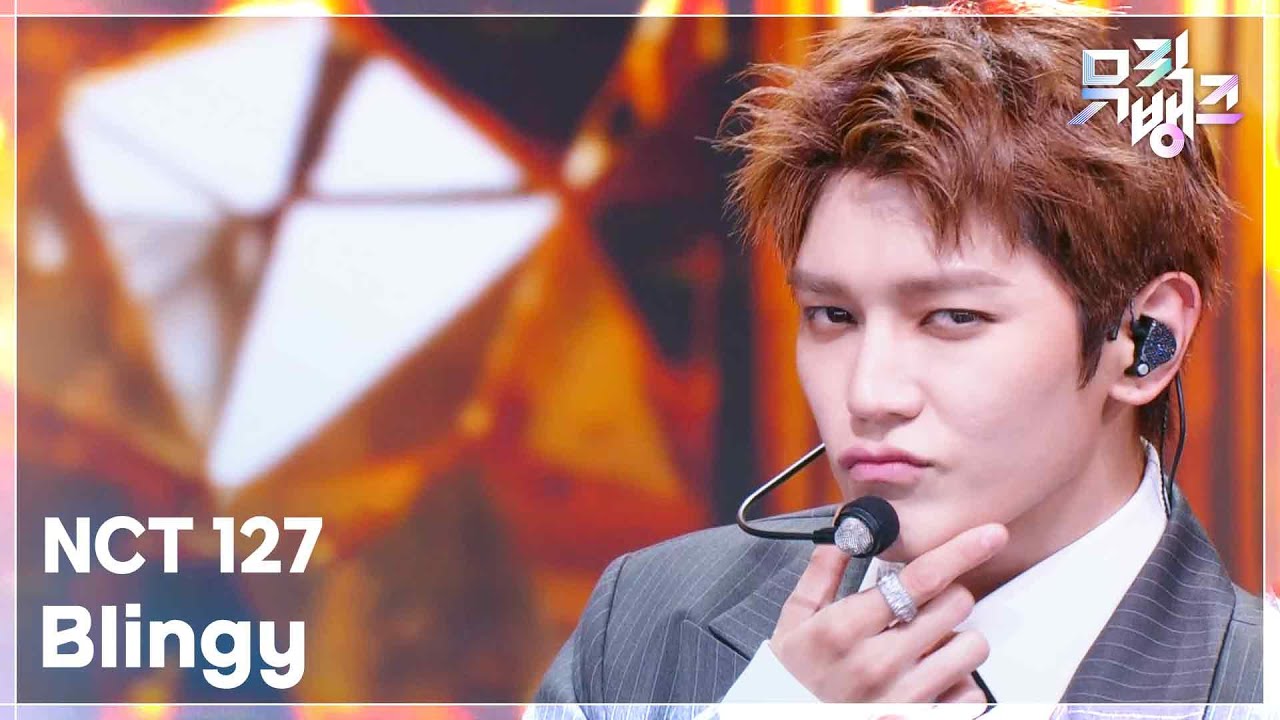 NCT 127　Music Bank　「BLINGY」を揃いのスーツで披露　ユウタとジャニーは革手袋